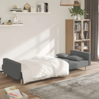 Canapé convertible en tissu avec oreillers