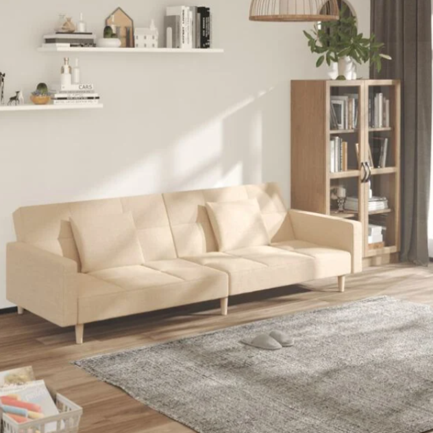 Canapé convertible en tissu avec oreillers