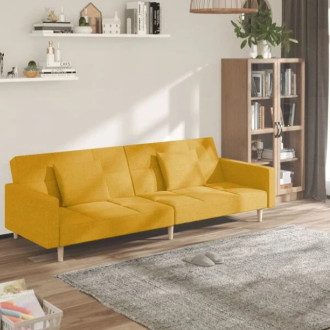 Canapé convertible en tissu avec oreillers