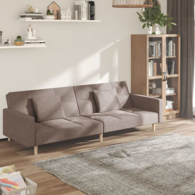 Canapé convertible en tissu avec oreillers